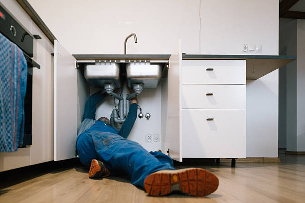 Professional Drain Cleaning technician working in Scottville, IL